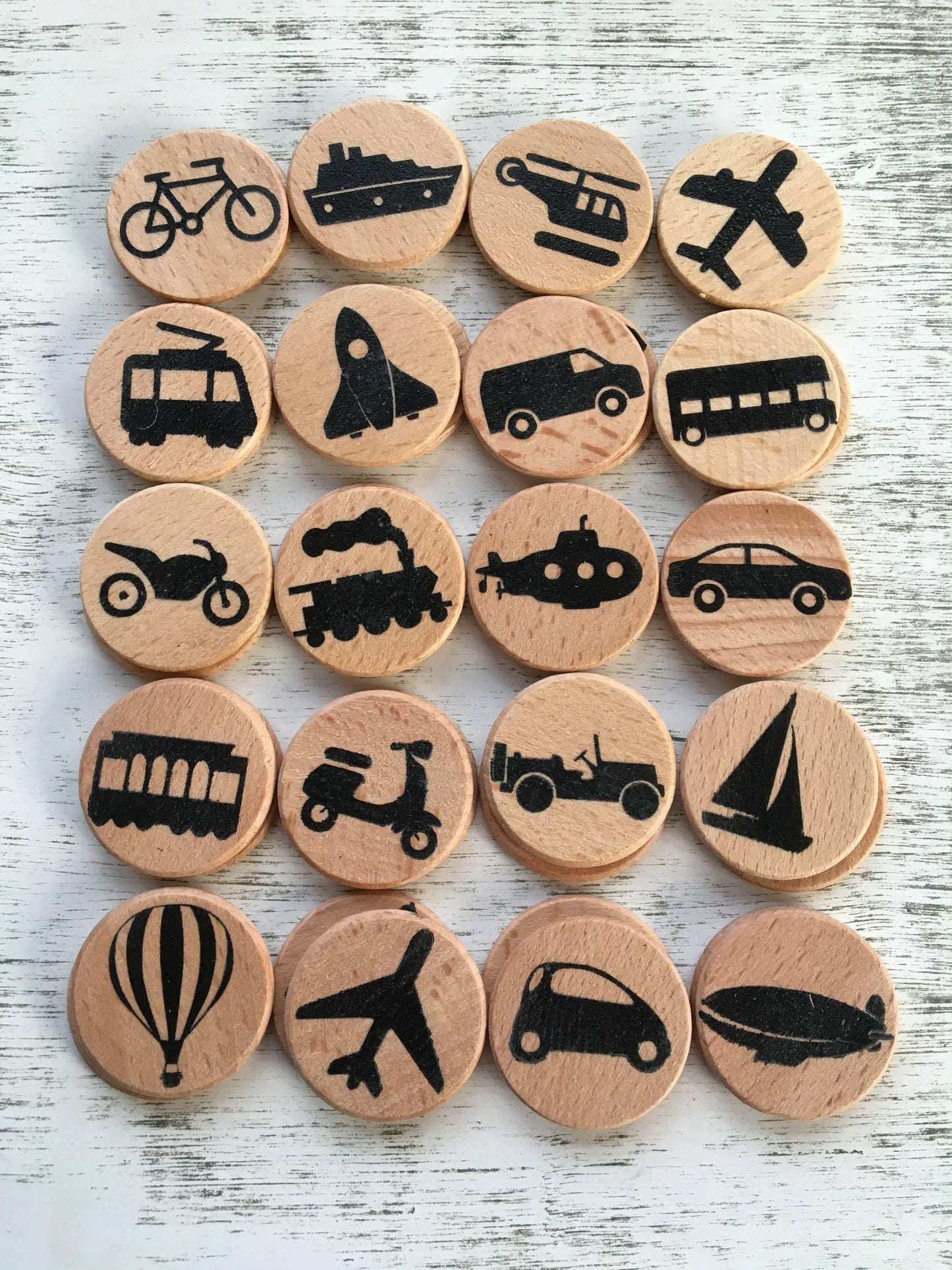 Transportation memory game. Montessori game for children and adults. Wooden pictures. Bike boat helicopter airplane streetcar rocket ship van bus motorcycle train submarine car trolley scooter jeep sail boat balloon blimp yacht